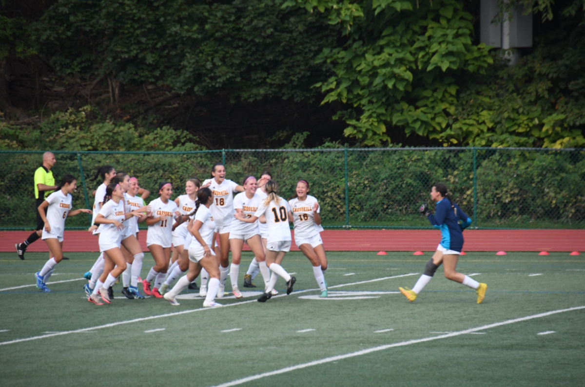 Above: The Cresskill Girls Soccer Team celebrating together.